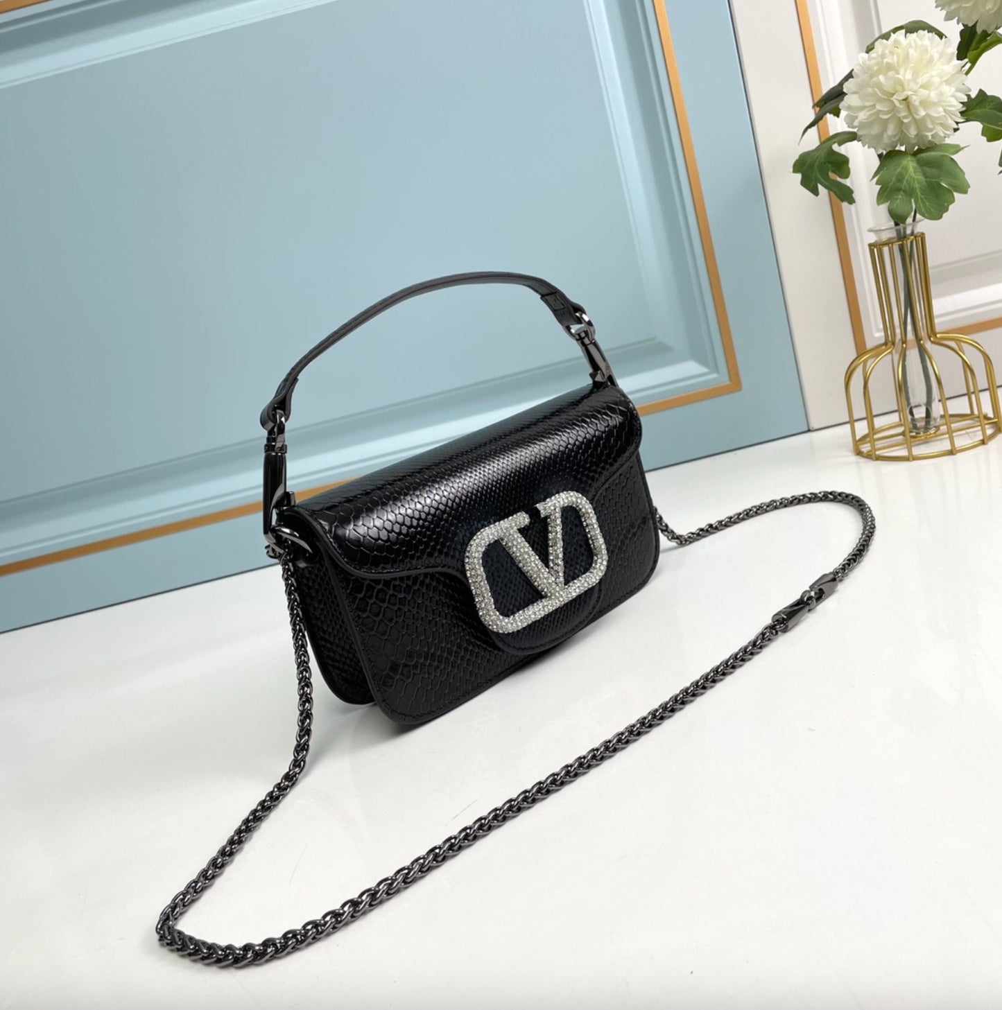 Valentino Garavani MINI LOCÒ Bag in Black Snake-Grain Leather with Diamond VLogo Signature