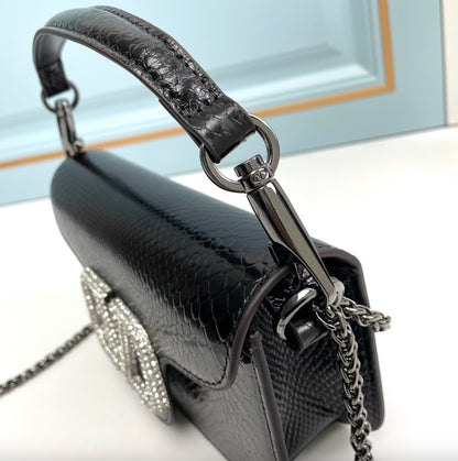 Valentino Garavani MINI LOCÒ Bag in Black Snake-Grain Leather with Diamond VLogo Signature